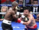 Timothy Bradley catches Manny Pacquiao with a left hook