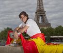 Rafael Nadal poses with his trophy in front of the Eiffel Tower