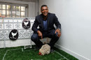 Marcel Desailly poses with a chicken