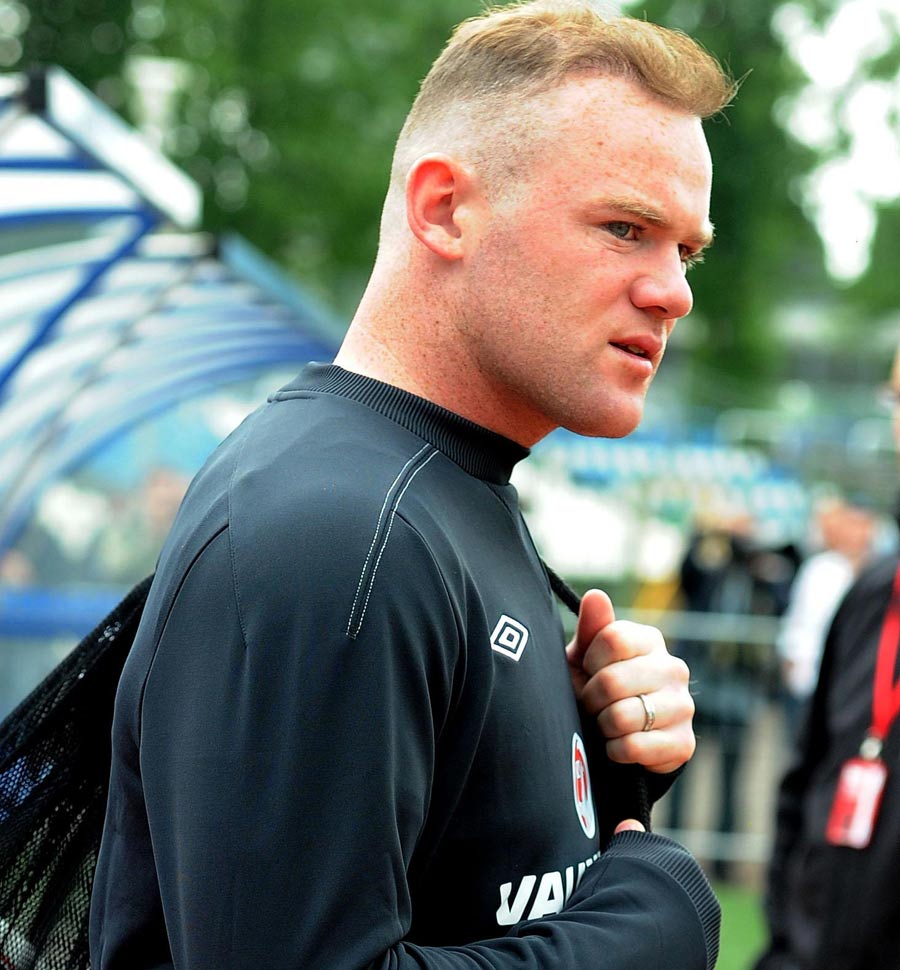 Wayne Rooney prepares for a training session