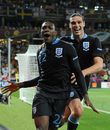 Danny Welbeck celebrates his winning goal with Andy Carroll
