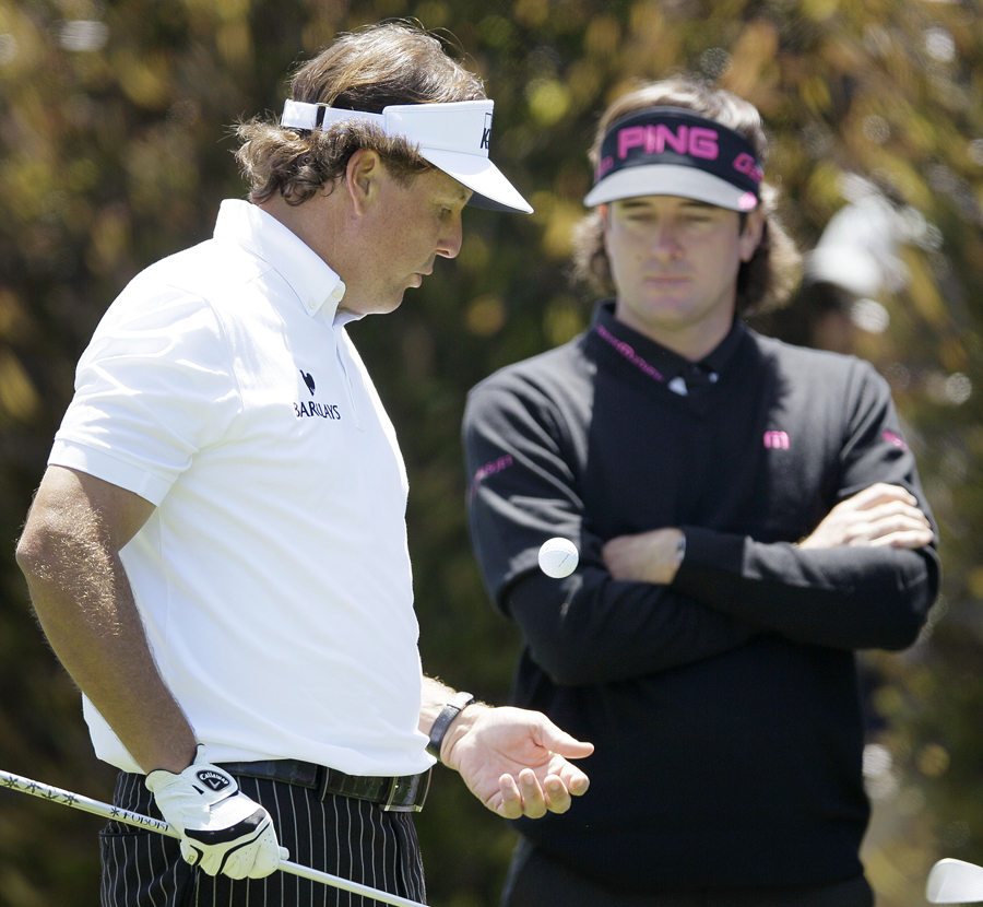 Bubba Watson watches Phil Mickelson