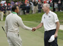 Tiger Woods shakes hands with Jim Furyk