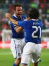 Antonio Cassano celebrates with Andrea Pirlo after scoring