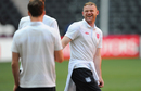 Wayne Rooney shares a joke with team-mates