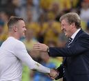 Wayne Rooney shakes hands with Roy Hodgson