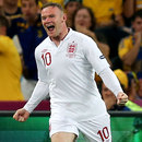 Wayne Rooney wheels away in delight