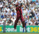 Dwayne Bravo is off his feet to play into the off side