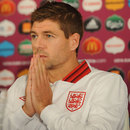 Steven Gerrard ponders a question at a press conference