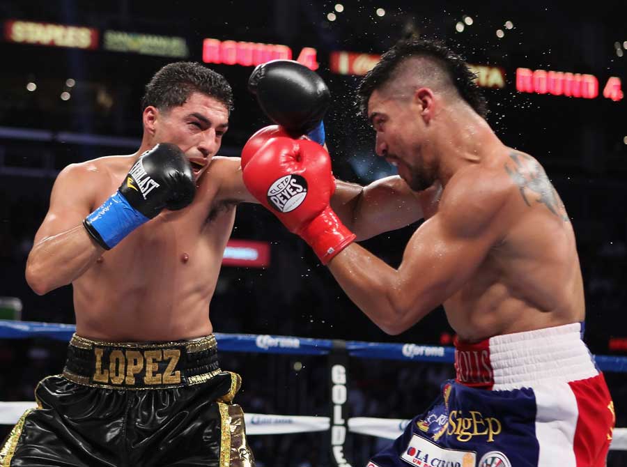 Josesito Lopez lands on Victor Ortiz