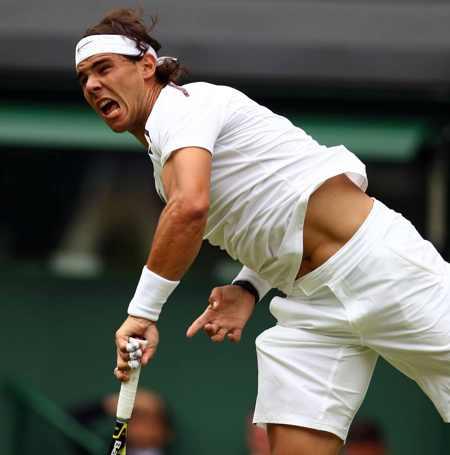 Rafael Nadal hammers down a serve