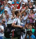 Andy Murray waves to the crowd after beating Nikolay Davydenko