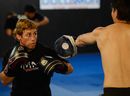 Urijah Faber works out for the media