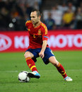 Andres Iniesta controls the ball