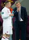 Wayne Rooney and Roy Hodgson discuss tactics