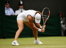 Sam Stosur slams her racket on the ground