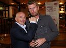 Barry McGuigan punches David Lynn at the CLIC Sargent Children's Cancer Charity function