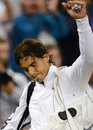 Rafael Nadal thanks the fans as he leaves the court