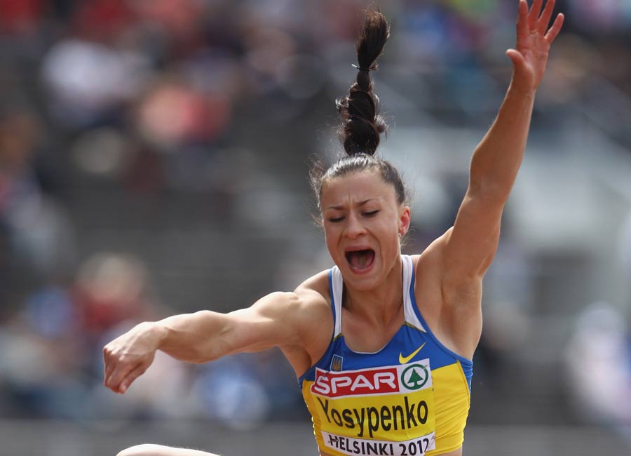 Lyudmyla Yosypenko gives it her all in the long jump
