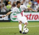 Joao Moutinho strikes his penalty