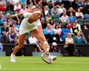 Petra Kvitova stretches to reach a drop shot