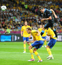 Andy Carroll powers a header on target