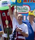 Joey Chestnut salutes his victory