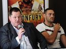 Mick Hennessy and Tyson Fury speak during a press conference