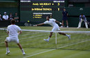 Andy Murray and Jo-Wilfried Tsonga do battle at the net