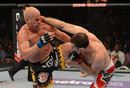 Forrest Griffin punches Tito Ortiz