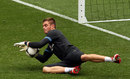 Jack Butland makes a save during an England training session