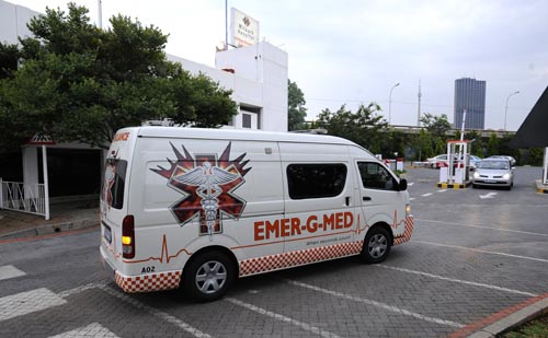 The ambulance carrying the injured Togo goalkeeper Kodjovi Obilale enters the Millpark Hospital