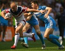 Wakefield's Damien Blanch breaks through Hull's defence