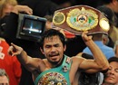 Manny Pacquiao celebrates after defeating Miguel Angel Cotto in their WBO welterweight championship fight