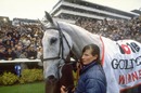 Janice Coyle leads Desert Orchid after his win in the Gold 