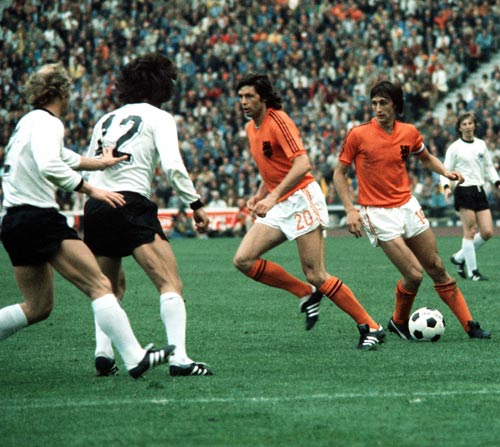 Johan Cruyff progresses with the ball