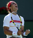Rafael Nadal celebrates his victory over John Isner