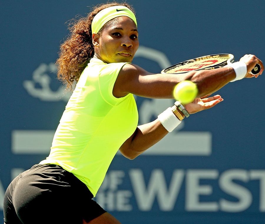 Serena Williams stretches for a backhand