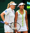 Elena Baltacha and Anne Keothavong confer during a doubles match