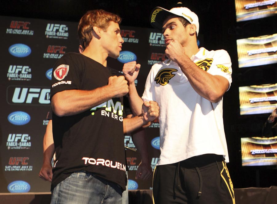 Urijah Faber and Renan Barao square off at the UFC 149 press conference