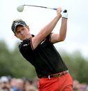 Luke Donald hits from the tee