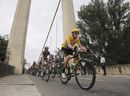 Bradley Wiggins passes a bridge near Castelsarrasin during the 18th stage of the Tour de France cycling race over 222.5 kilometers (138.3 miles) with start in Blagnac and finish in Brive-la-Gaillarde, France, Friday July 20, 2012