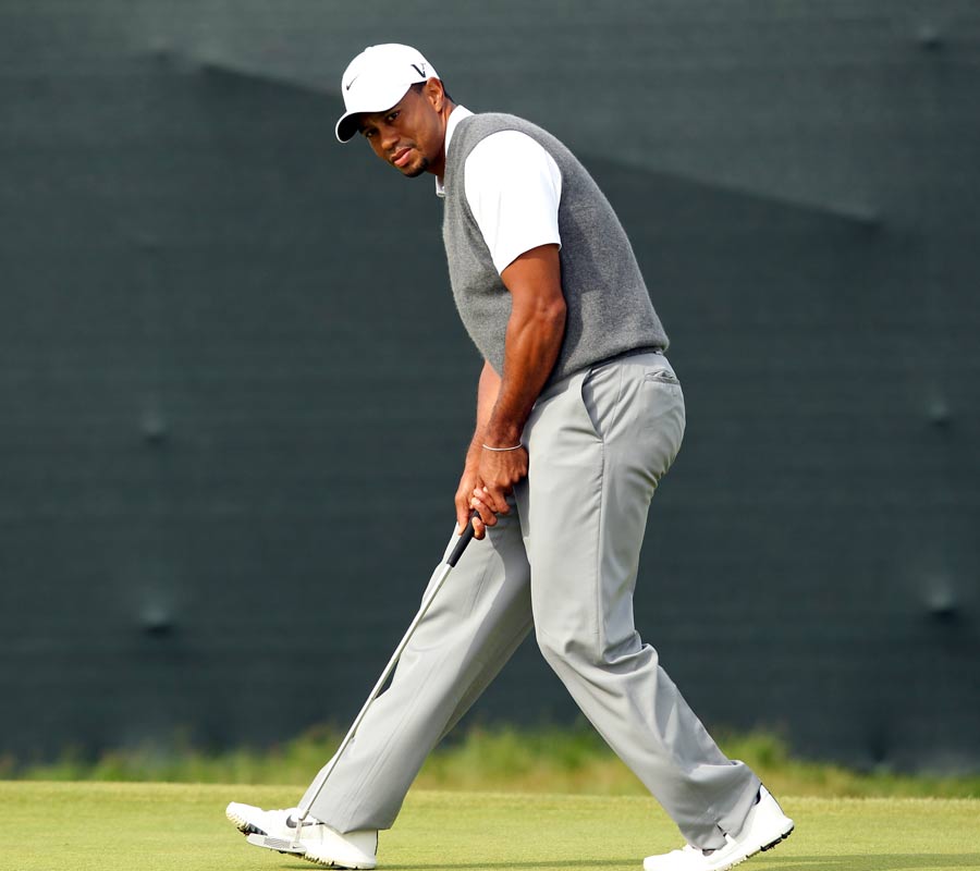 Tiger Woods struts on the green