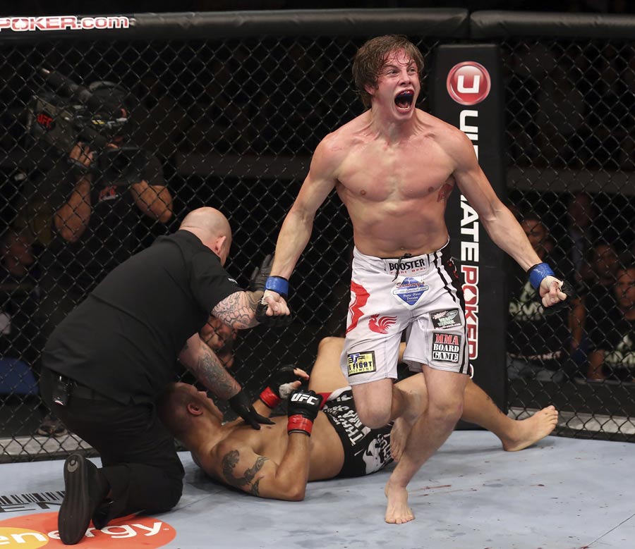 Matthew Riddle celebrates after defeating Chris Clements