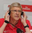 Arsene Wenger struggles to hear the question