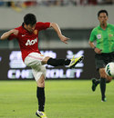 Shinji Kagawa volleys a shot on goal