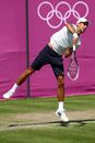 Novak Djokovic fires down a serve in practice