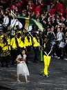 Usain Bolt leads out the Jamaican team