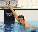 Michael Phelps reacts in disgust to finishing fourth