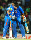 Suresh Raina is congratulated by Irfan Pathan after India's victory off the last over